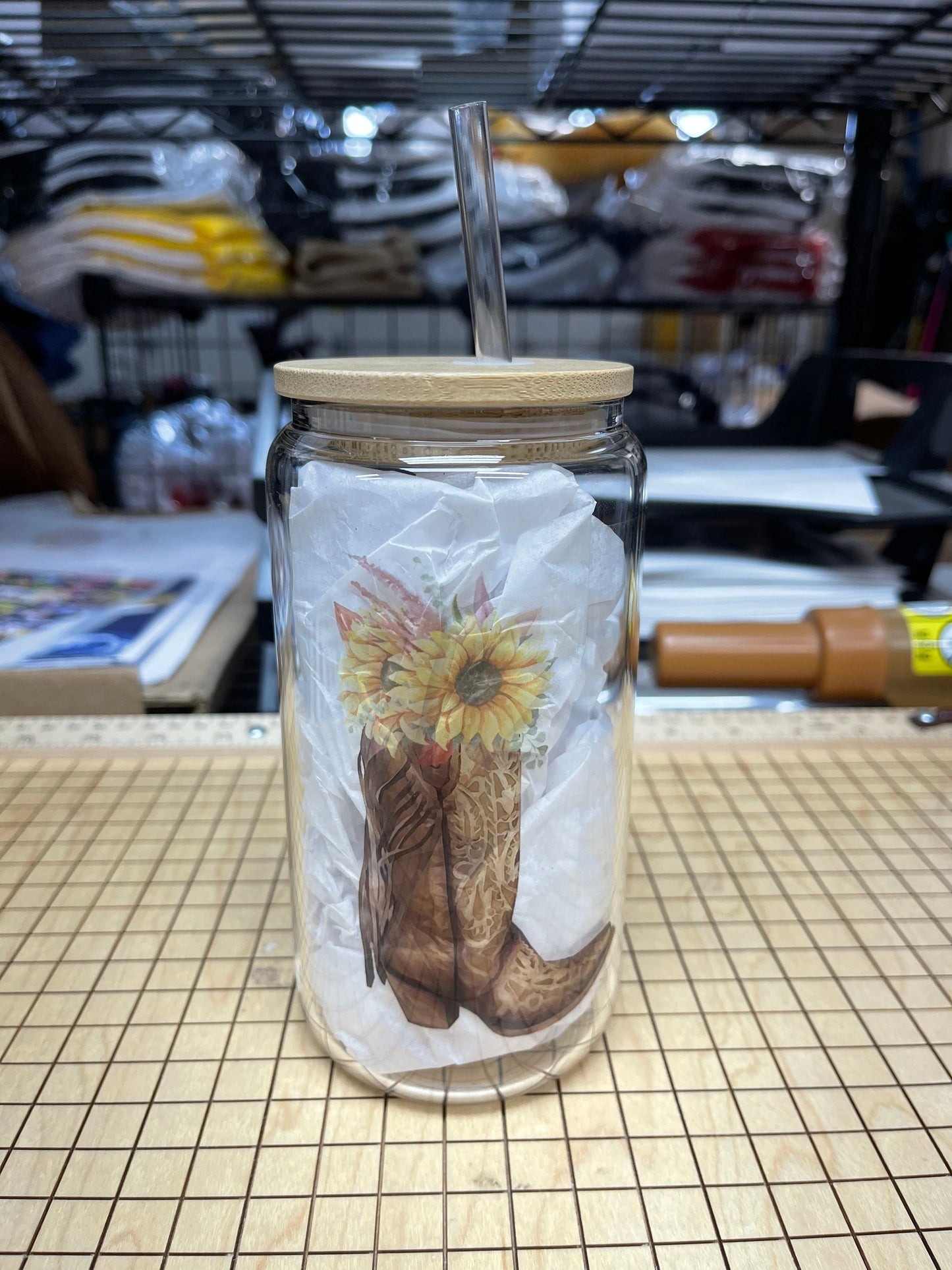16oz Glass tumbler. Cowgirl boot with sunflowers. Comes with bamboo lid and plastic straw.
