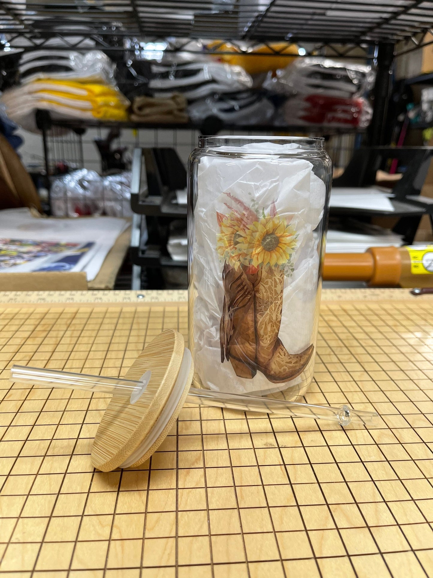 16oz Glass tumbler. Cowgirl boot with sunflowers. Comes with bamboo lid and plastic straw.