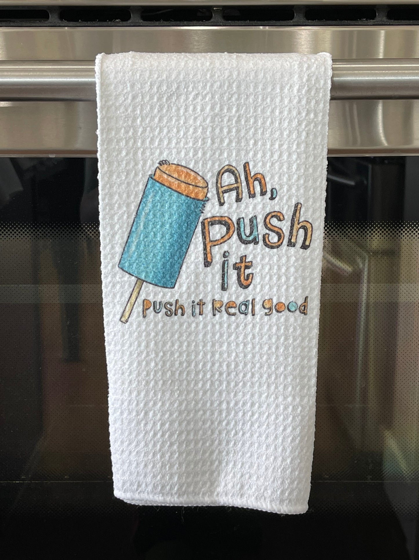 Ah push it. push it real good.  summertime frozen treat  kitchen towel