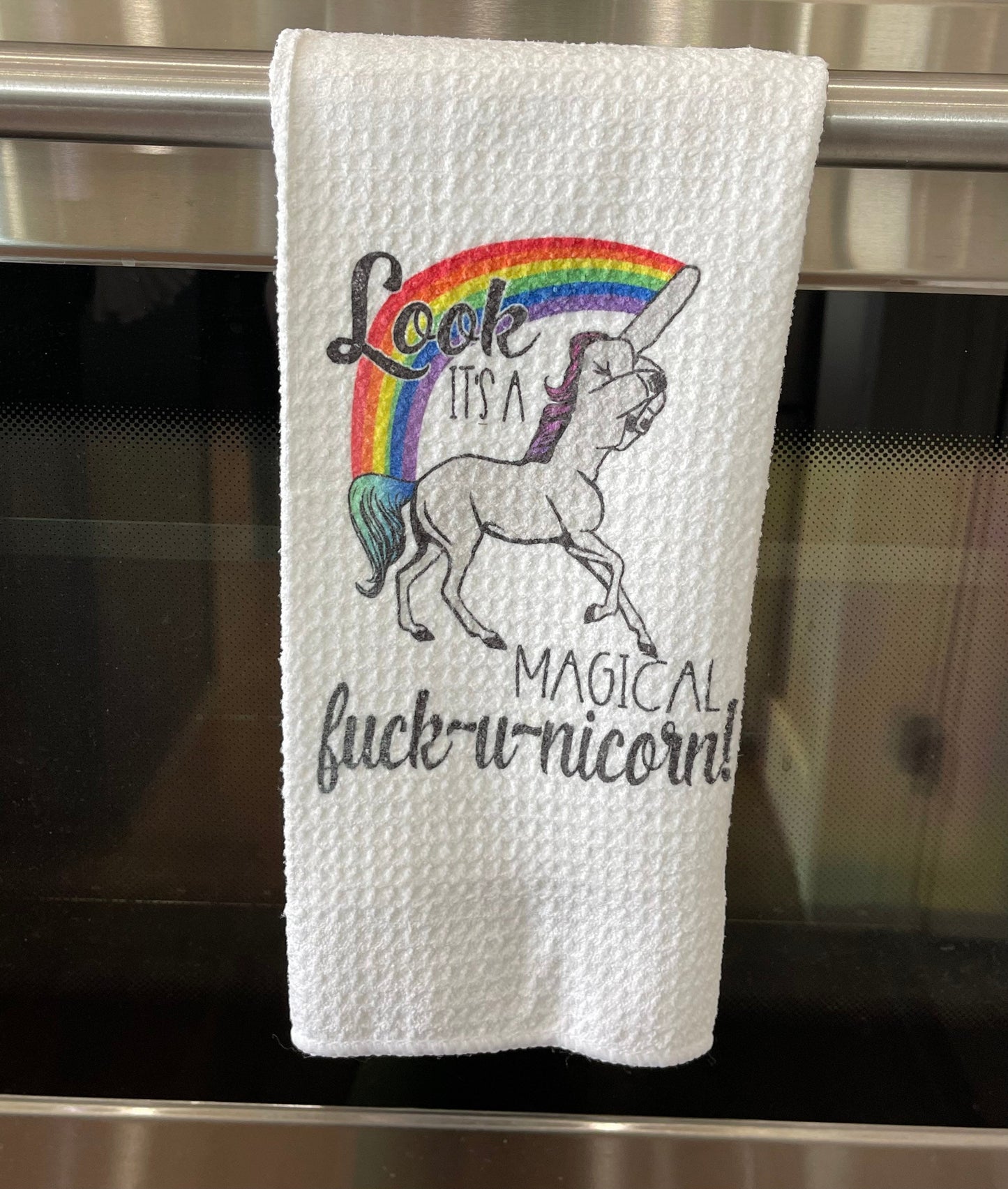 Look it’s a magical fuck-u-nicorn kitchen towel